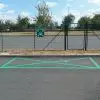 Exemple d'application de la peinture routière certifiée en couleur vert