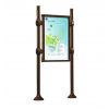 Panneau d'affichage avec vitrine simple face marron sur poteaux modèle city format portrait 12 ou 24 A4