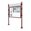 Panneau d'affichage avec vitrine double face et bandeau sur poteaux boules format paysage aspect corten