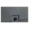 Zoom partie basse cuve grise équipée d’un passe paroi avec bouchon