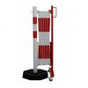 Barrière extensible rouge et blanche avec socle mobile
