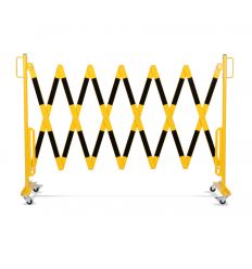 Barrière extensible industrielle jaune et noir ouverte 