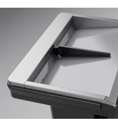 Séparateur d'article dans le bac de caisse