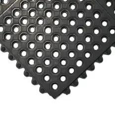 Caillebotis anti fatigue en nitrile perforé 