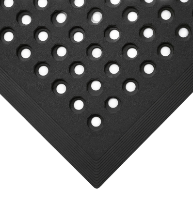 Tapis en caoutchouc perforé pour atelier humide